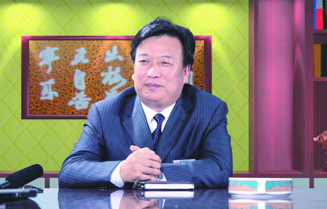 李万清与枝江市市长余峰.jpg